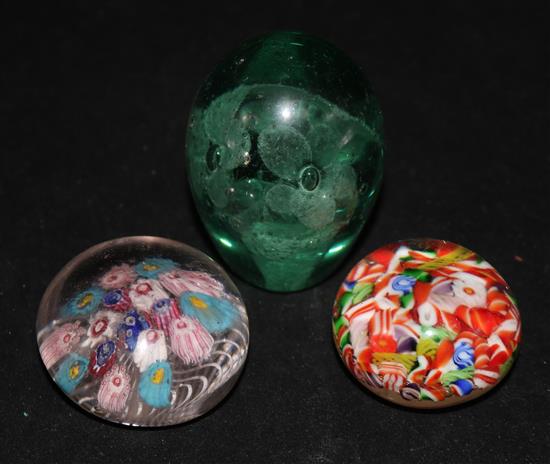 Three small glass paperweights